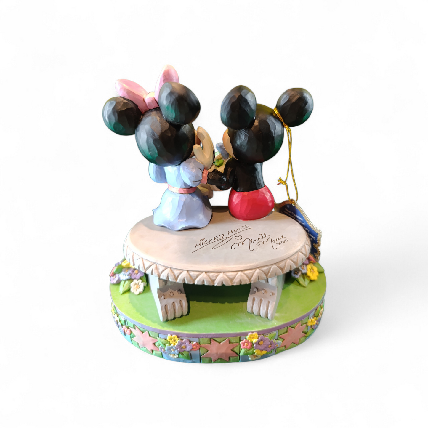 TOPOLINO E MINNIE SULLA PANCHINA DI PRIMAVERA