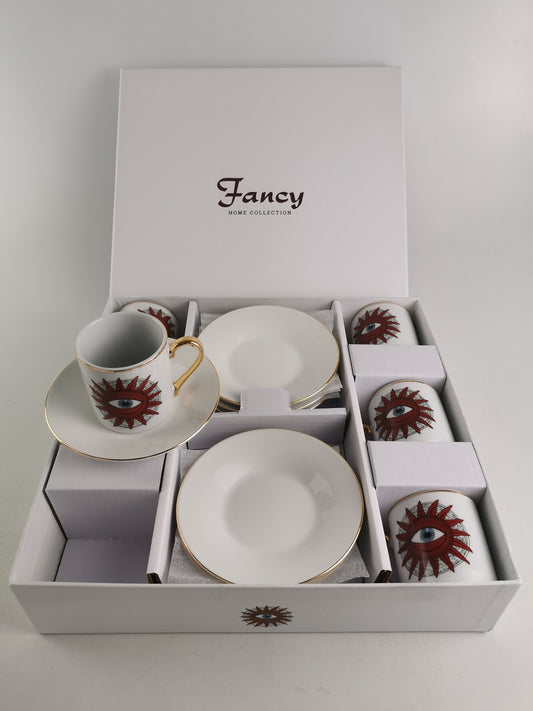 Confezione di 6 Tazzine per caffè tipo espresso con piattino, bordate in oro e decoro con sole e occhio centrale