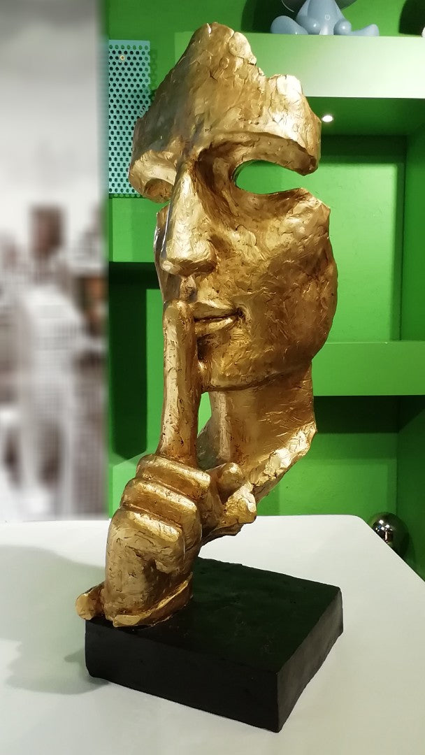 Statua Silenzio Testa Dorata su Base Nera