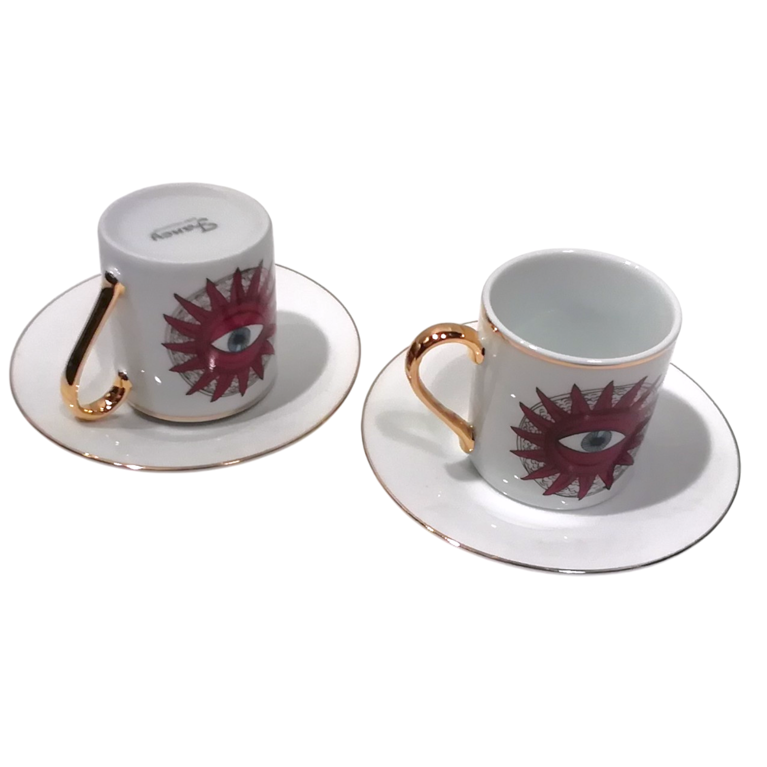 Tazzine per caffè tipo espresso con piattino, bordate in oro e decoro con sole e occhio centrale