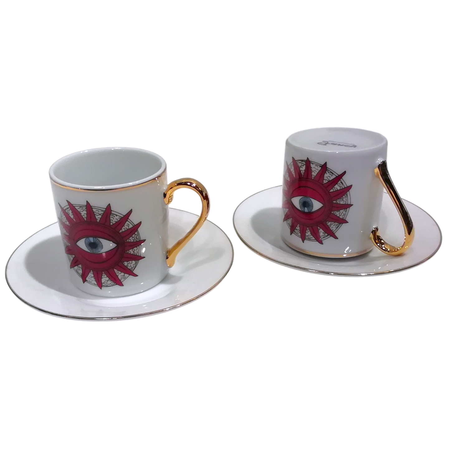Tazzine per caffè tipo espresso con piattino, bordate in oro e decoro con sole e occhio centrale