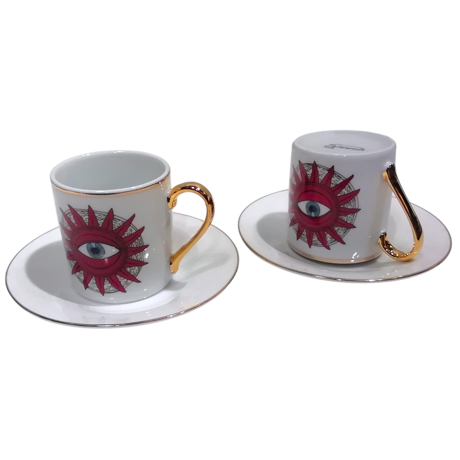 Tazzine per caffè tipo espresso con piattino, bordate in oro e decoro con sole e occhio centrale