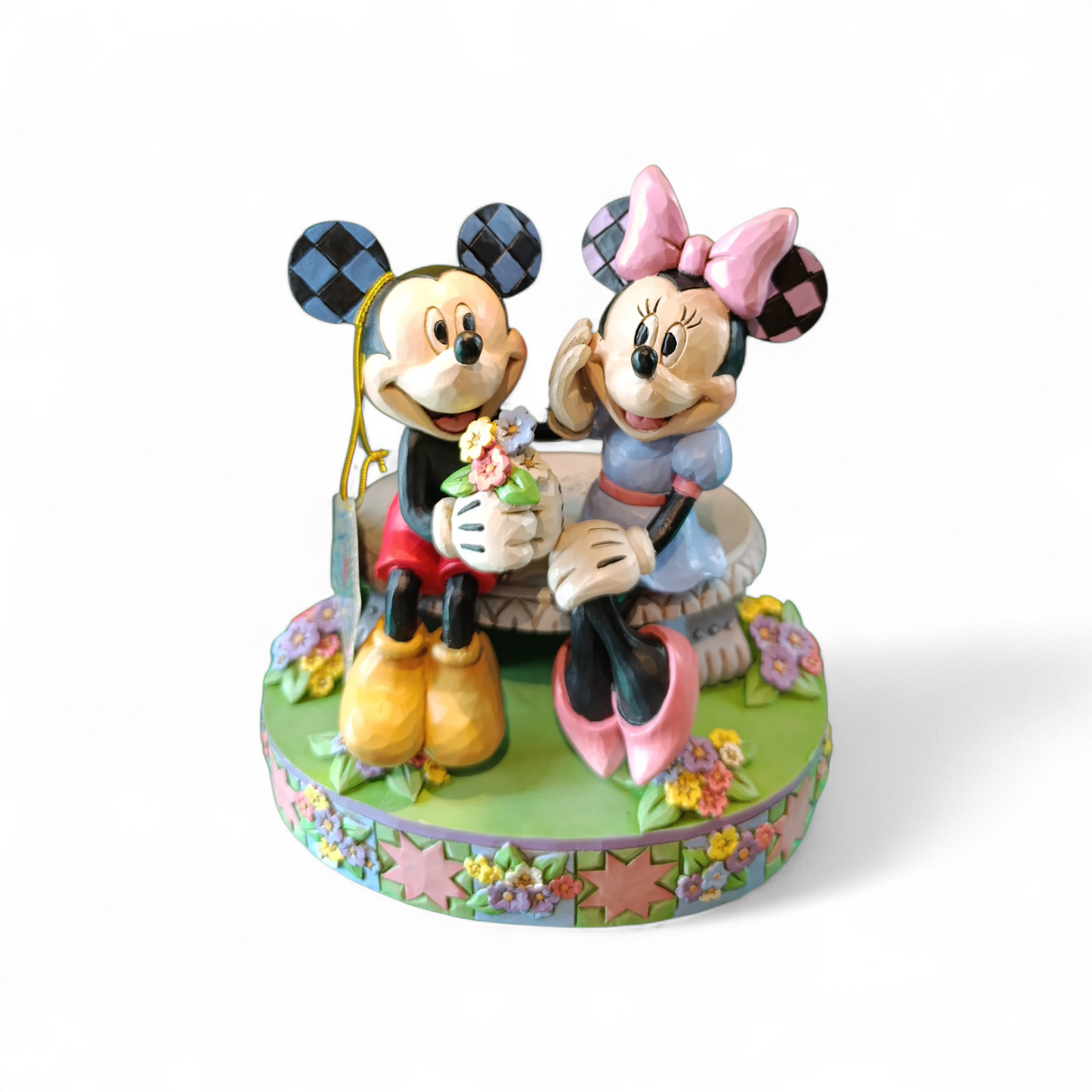 TOPOLINO E MINNIE SULLA PANCHINA DI PRIMAVERA
